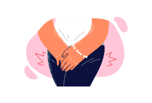 A woman needing to pee urgently holding her pee in with stress.